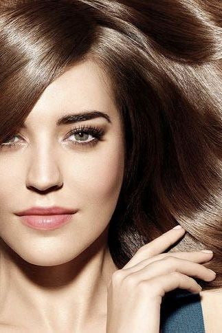 Woman with long, wavy brown hair